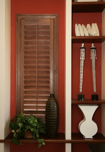 You can even coordinate your wood shutters with shelving. San Antonio wood shutter shelving
